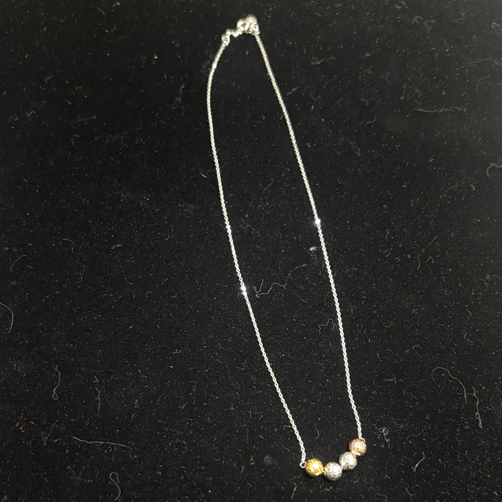 Elegant Silver and Gold Beaded Necklace